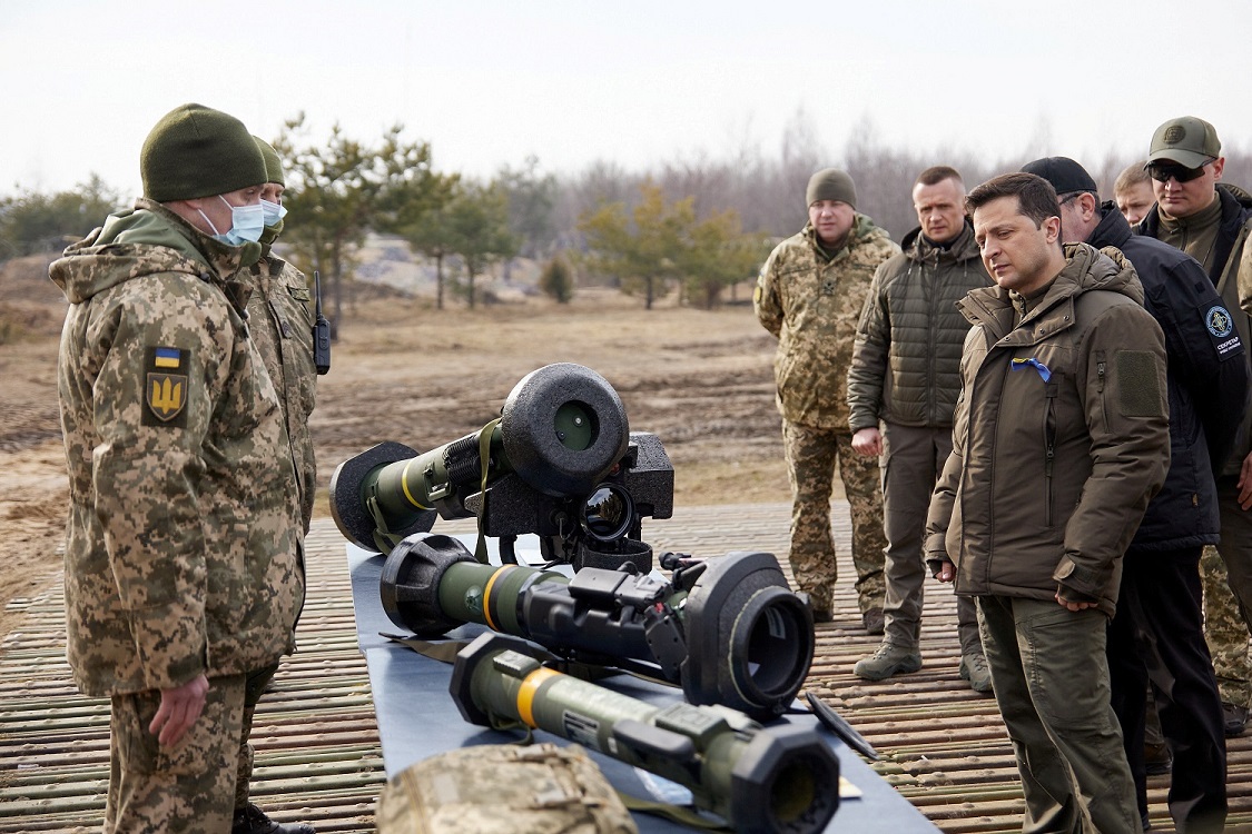 Ukrainian President Volodymyr Zelensky examines NATO-supplied weapons, including UK NLAW and U.S. Javelin anti-tank missiles, as he attends tactical military exercises held by the country's armed forces at a training ground in the Rivne Region, Ukraine February 16, 2022.